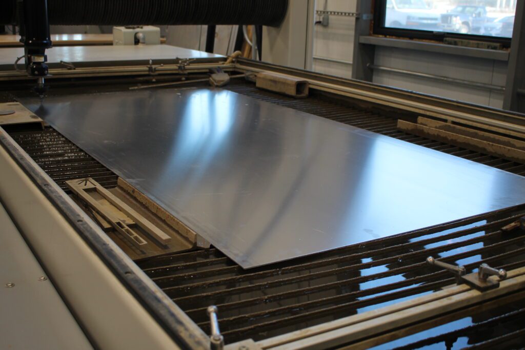 Waterjet cutting sheet metal